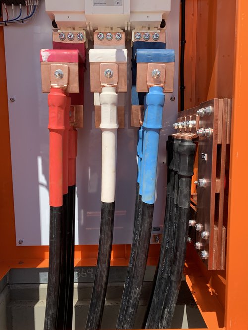 Cables terminated on bus bars